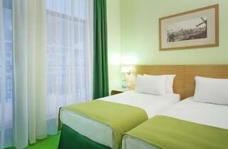 Отель Tulip Inn Rosa Khutor Hotel Эсто-садок Стандартный двухместный номер с 1 кроватью или 2 отдельными кроватями-1